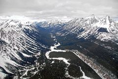 38 Mount Turbulent, Goatview Peak, Spray River, Old Goat Mountain, Nestor Peak From Helicopter Between Mount Assiniboine And Canmore In Winter.jpg